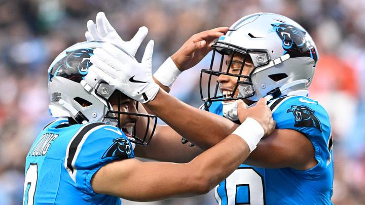 Aug 8, 2025; Charlotte, North Carolina, USA; Carolina Panthers wide receiver Jalen Coker (18) celebrates with quarterback Bryce Young (9) after a touchdown catch in the first quarter at Bank of America Stadium. Mandatory Credit: Bob Donnan-Imagn Images Aug 8, 2025; Charlotte, North Carolina, USA; Carolina Panthers wide receiver Jalen Coker (18) celebrates with quarterback Bryce Young (9) after a touchdown catch in the first quarter at Bank of America Stadium. Mandatory Credit: Bob Donnan-Imagn Images