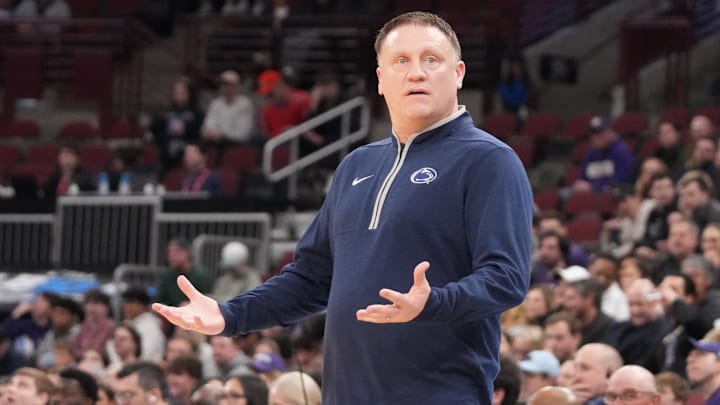 Penn State Nittany Lions men's basketball coach Mike Rhoades gestures to his team against the Northwestern Wildcats during the first half at United Center. 