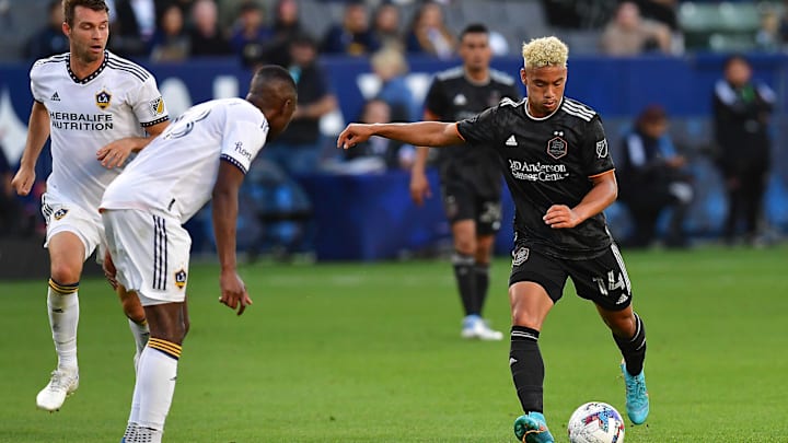 May 22, 2022; Carson, California, USA; Houston Dynamo forward Roberto Avila (14) shoots on goal