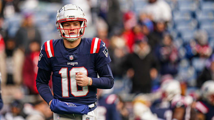 Jan 5, 2025; Foxborough, Massachusetts, USA; New England Patriots quarterback Drake Maye (10) warms up before the start of the game against the Buffalo Bills at Gillette Stadium. Mandatory Credit: David Butler II-Imagn Images