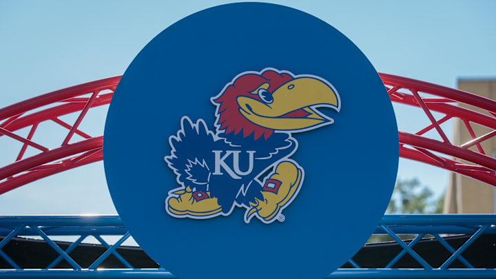 Oct 1, 2022; Lawrence, Kansas, USA; Kansas Jayhawks logo at entrance to the field prior to the game between the Kansas Jayhawks and the Iowa State Cyclones at David Booth Kansas Memorial Stadium. Mandatory Credit: William Purnell-Imagn Images Oct 1, 2022; Lawrence, Kansas, USA; Kansas Jayhawks logo at entrance to the field prior to the game between the Kansas Jayhawks and the Iowa State Cyclones at David Booth Kansas Memorial Stadium. Mandatory Credit: William Purnell-Imagn Images