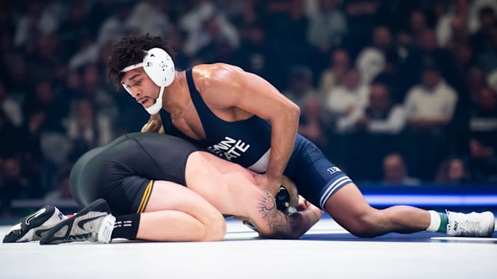 Penn State’s Carter Starocci, top, wrestles Iowa's Angelo Ferrari in the 184-pound bout of their Big Ten dual match at the Bryce Jordan Center. Penn State’s Carter Starocci, top, wrestles Iowa's Angelo Ferrari in the 184-pound bout of their Big Ten dual match at the Bryce Jordan Center.