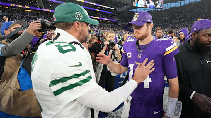Oct 6, 2024; London, United Kingdom; New York Jets quarterback Aaron Rodgers (8) shakes hands with Minnesota Vikings quarterback Sam Darnold (14) after the game at Tottenham Hotspur Stadium. Oct 6, 2024; London, United Kingdom; New York Jets quarterback Aaron Rodgers (8) shakes hands with Minnesota Vikings quarterback Sam Darnold (14) after the game at Tottenham Hotspur Stadium.