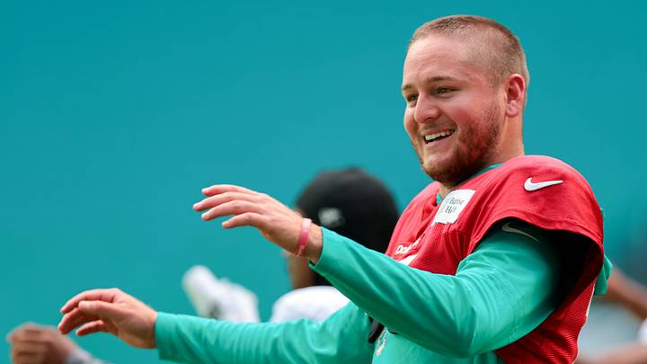 Aug 8, 2026; Miami Gardens, FL, USA; Miami Dolphins quarterback Quinn Ewers (14) works during practice at Hard Rock Stadium. 