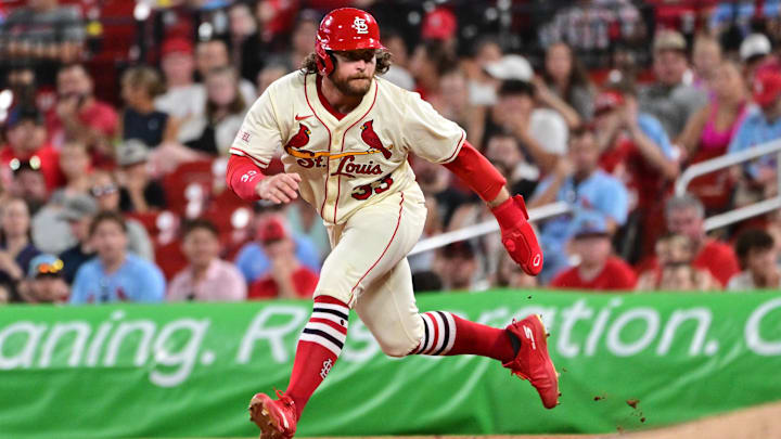 Jul 26, 2025; St. Louis, Missouri, USA;  St. Louis Cardinals second baseman Brendan Donovan (33) takes a big leadoff from first base against the San Diego Padres at Busch Stadium. Mandatory Credit: Tim Vizer-Imagn Images