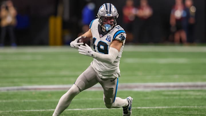 Jan 5, 2025; Atlanta, Georgia, USA; Carolina Panthers wide receiver Adam Thielen (19) runs after a catch against the Atlanta Falcons in overtime at Mercedes-Benz Stadium. Mandatory Credit: Brett Davis-Imagn Images