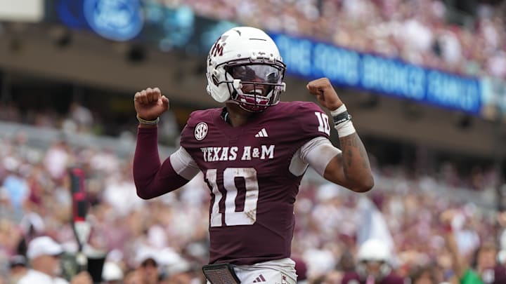 Sep 6, 2025; College Station, Texas, USA; Texas A&M Aggies quarterback Marcel Reed (10) celebrates after a touchdown pass during the second quarter against the Utah State Aggies at Kyle Field. Mandatory Credit: Sean Thomas-Imagn Images
