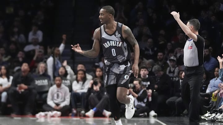 Apr 6, 2025; Brooklyn, New York, USA; Brooklyn Nets forward Dariq Whitehead (0) reacts to making a three point shot against the Toronto Raptors during the first half at Barclays Center. Mandatory Credit: Gregory Fisher-Imagn Images