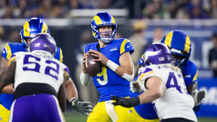 Jan 13, 2025; Glendale, AZ, USA; Los Angeles Rams quarterback Matthew Stafford (9) against the Minnesota Vikings during an NFC wild card game at State Farm Stadium. Mandatory Credit: Mark J. Rebilas-Imagn Images