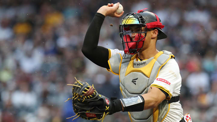 Apr 5, 2025; Pittsburgh, Pennsylvania, USA;  Pittsburgh Pirates catcher Endy Rodriguez (5) chases New York Yankees second baseman Jazz Chisholm Jr. (not pictured) in a fielders choice run down during the seventh inning at PNC Park. Mandatory Credit: Charles LeClaire-Imagn Images