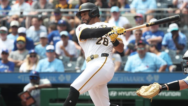 Aug 20, 2025; Pittsburgh, Pennsylvania, USA;  Pittsburgh Pirates left fielder Tommy Pham (28) hits a two run double against the Toronto Blue Jays during the first inning at PNC Park. Mandatory Credit: Charles LeClaire-Imagn Images