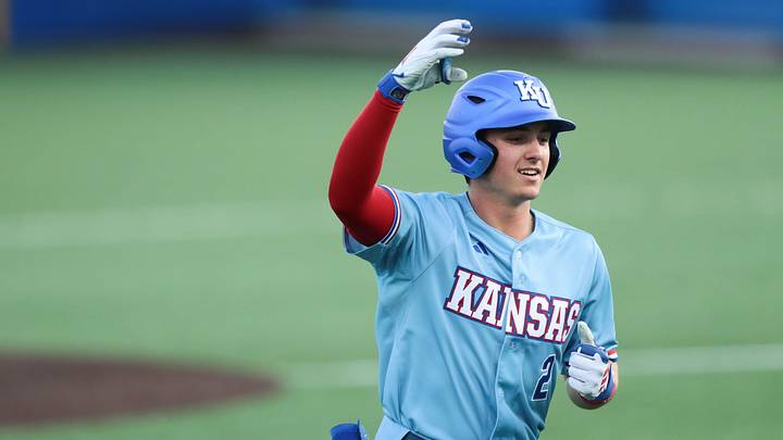 Kansas junior infielder Tyson LeBlanc (2) puts his hand up after a home run against Wichita State during the game at Hoglund Ballpark on April 14, 2026. Kansas junior infielder Tyson LeBlanc (2) puts his hand up after a home run against Wichita State during the game at Hoglund Ballpark on April 14, 2026.