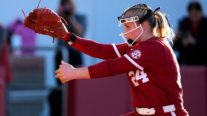 Oklahoma's Audrey Lowry fires to home plate at Love's Field.