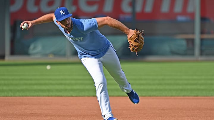 Sep 18, 2024; Kansas City, Missouri, USA;  Kansas City Royals third baseman Paul DeJong (15) takes fielding practice before a game against the Detroit Tigers at Kauffman Stadium.