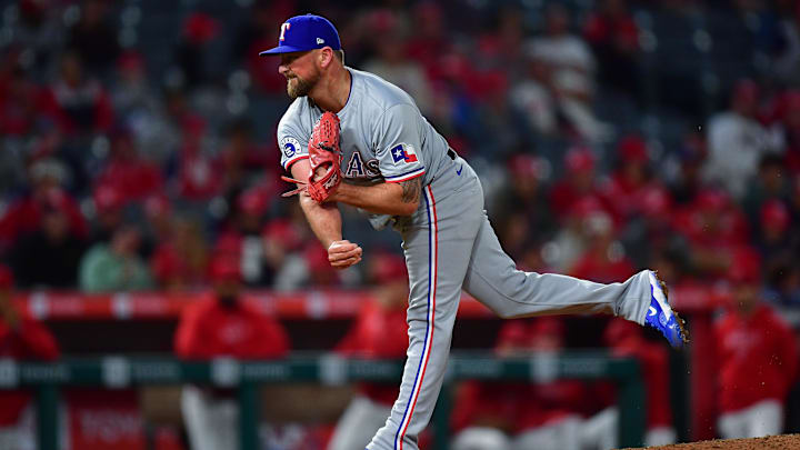 Sep 27, 2024; Anaheim, California, USA; Texas Rangers pitcher Kirby Yates (39) throws against the Los Angeles Angels during the ninth inning at Angel Stadium.
