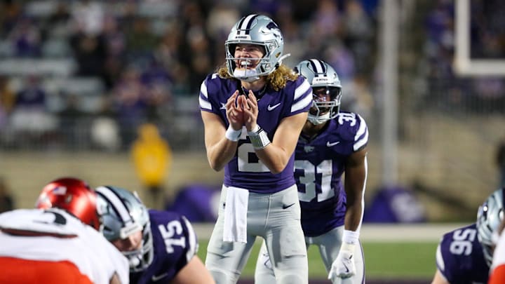 Nov 23, 2024; Manhattan, Kansas, USA; Kansas State Wildcats quarterback Avery Johnson (2) waits for the snap during the third quarter against the Cincinnati Bearcats at Bill Snyder Family Football Stadium. Mandatory Credit: Scott Sewell-Imagn Images