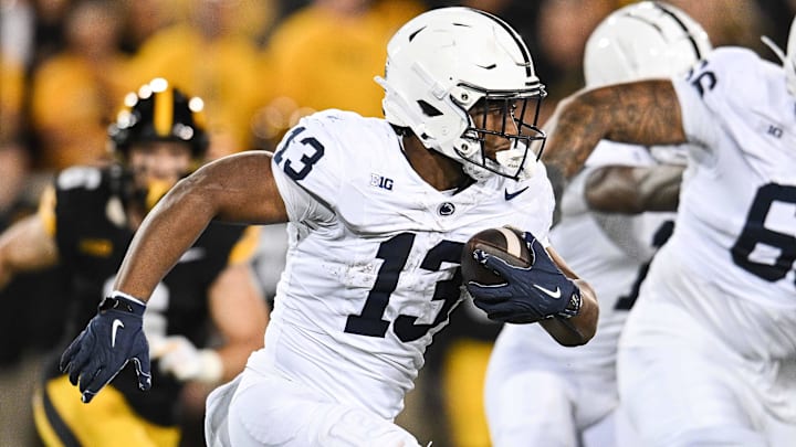 Oct 18, 2025; Iowa City, Iowa, USA; Penn State Nittany Lions running back Kaytron Allen (13) runs the ball against the Iowa Hawkeyes during the second quarter at Kinnick Stadium. Mandatory Credit: Jeffrey Becker-Imagn Images