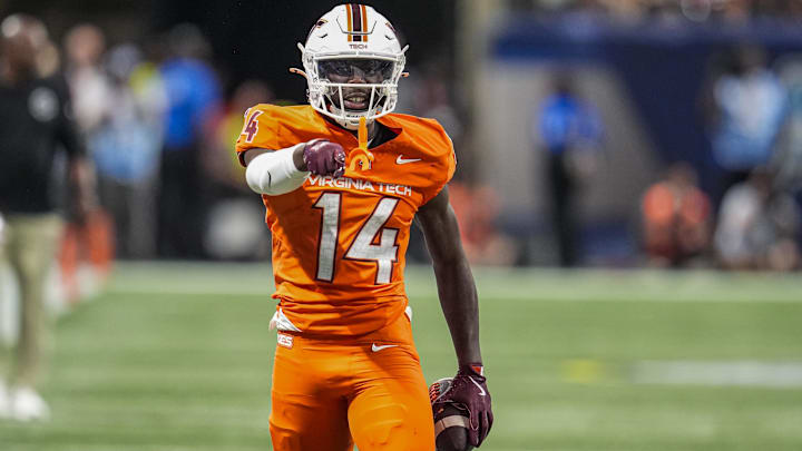 Aug 31, 2025; Atlanta, Georgia, USA; Virginia Tech Hokies wide receiver Isaiah Spencer (14) reacts after making a catch against the South Carolina Gamecocks during the second half at Mercedes-Benz Stadium. Mandatory Credit: Dale Zanine-Imagn Images
