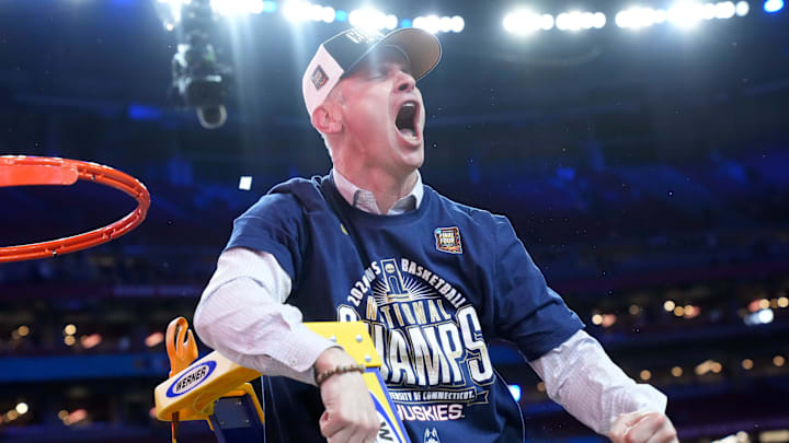 Apr 8, 2024; Glendale, Ariz, U.S.; Connecticut Huskies head coach Dan Hurley cuts down the net. Apr 8, 2024; Glendale, Ariz, U.S.; Connecticut Huskies head coach Dan Hurley cuts down the net.