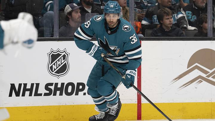 Apr 11, 2026; San Jose, California, USA; San Jose Sharks defenseman Mario Ferraro (38) controls the puck during the first period against the Vancouver Canucks at SAP Center at San Jose. Mandatory Credit: Stan Szeto-Imagn Images Apr 11, 2026; San Jose, California, USA; San Jose Sharks defenseman Mario Ferraro (38) controls the puck during the first period against the Vancouver Canucks at SAP Center at San Jose. Mandatory Credit: Stan Szeto-Imagn Images