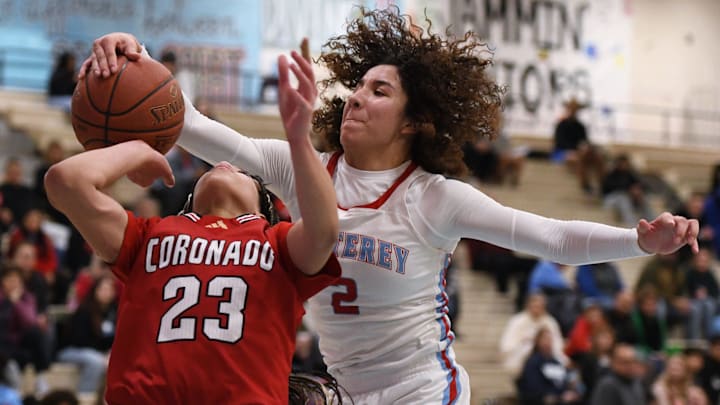 Monterey's Aaliyah Chavez blocks a shot by Coronado's Kamryn Hill in a District 3-5A girls basketball game Tuesday, Jan. 7, 2025, at Monterey High School.