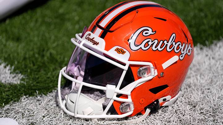 An Oklahoma State helmet with Cowboys in script on the side. An Oklahoma State helmet with Cowboys in script on the side.