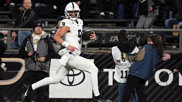 Nov 16, 2024; West Lafayette, Indiana, USA; Penn State Nittany Lions quarterback Beau Pribula (9) runs the ball toward the end zone during the second half against the Purdue Boilermakers at Ross-Ade Stadium. Mandatory Credit: Marc Lebryk-Imagn Images