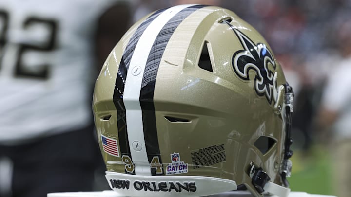 Oct 15, 2023; Houston, Texas, USA; View of a Crucial Catch logo on the helmet of New Orleans Saints defensive end Cameron Jordan (94) before the game against the Houston Texans at NRG Stadium. Mandatory Credit: Troy Taormina-Imagn Images
