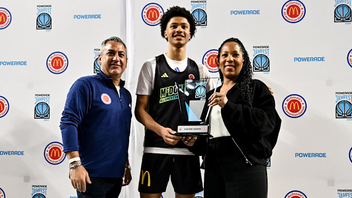 Apr 1, 2024; Houston, TX, USA; McDonalds High School All American guard Jalil Bethea (1) poses with the trophy after winning the dunk competition in the 2024 McDonalds High School All American Powerade Jam Fest at Delmar Fieldhouse. Mandatory Credit: Maria Lysaker-Imagn Images