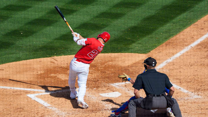 Tempe, Arizona, USA; Los Angeles Angels outfielder Mike Trout (27) doubles on a line drive to left in the bottom of the sixth inning during a spring training game against the Chicago Cubs at Tempe Diablo Stadium.