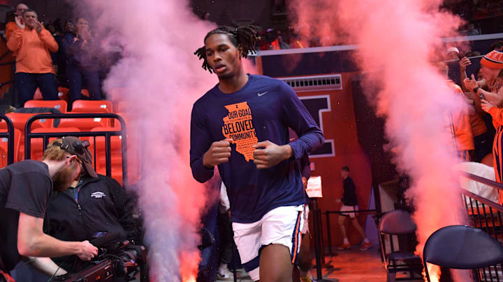 Jan 23, 2025; Champaign, Illinois, USA;  Illinois Fighting Illini forward Morez Johnson Jr. (21) takes the court with teammates before a game with the Maryland Terrapins at State Farm Center. Mandatory Credit: Ron Johnson-Imagn Images