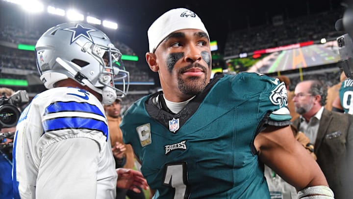 Nov 5, 2023; Philadelphia, Pennsylvania, USA; Dallas Cowboys quarterback Dak Prescott (4) and Philadelphia Eagles quarterback Jalen Hurts (1) meet on the field after Eagles win at Lincoln Financial Field. Mandatory Credit: Eric Hartline-Imagn Images