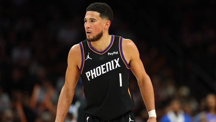 Apr 27, 2026; Phoenix, Arizona, USA; Phoenix Suns guard Devin Booker (1) against the Oklahoma City Thunder during game four of the first round of the 2026 NBA Playoffs at Mortgage Matchup Center. Mandatory Credit: Mark J. Rebilas-Imagn Images Apr 27, 2026; Phoenix, Arizona, USA; Phoenix Suns guard Devin Booker (1) against the Oklahoma City Thunder during game four of the first round of the 2026 NBA Playoffs at Mortgage Matchup Center. Mandatory Credit: Mark J. Rebilas-Imagn Images