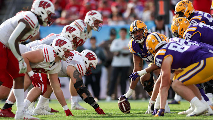 Jan 1, 2024; Tampa, FL, USA;  LSU Tigers offensive lineman Charles Turner III (69) lines up against the Wisconsin Badgers in the fourth quarter during the ReliaQuest Bowl at Raymond James Stadium. Mandatory Credit: Nathan Ray Seebeck-USA TODAY Sports