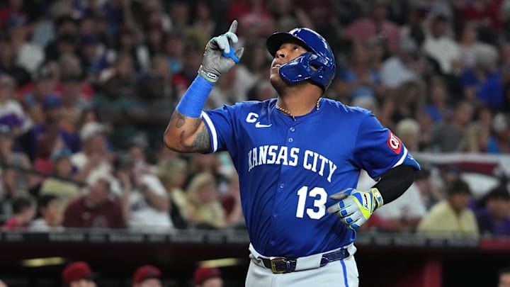 Jul 6, 2025; Phoenix, Arizona, USA; Kansas City Royals catcher Salvador Perez (13) celebrates after hitting a solo home run against the Arizona Diamondbacks in the fourth inning at Chase Field. Mandatory Credit: Rick Scuteri-Imagn Images