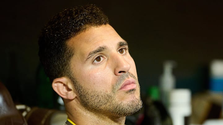 Aug 12, 2025; San Francisco, California, USA; San Diego Padres outfielder Ramon Laureano (5) looks on in the dugout against the San Francisco Giants during the seventh inning at Oracle Park. Mandatory Credit: Robert Edwards-Imagn Images