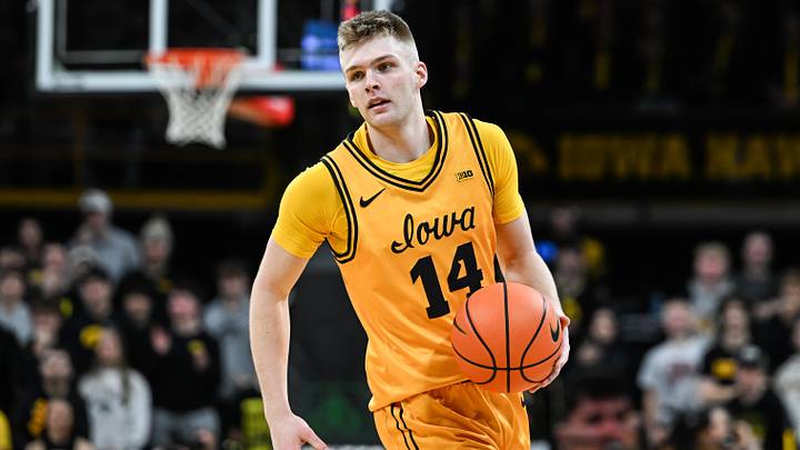 Feb 8, 2026; Iowa City, Iowa, USA; Iowa Hawkeyes guard Bennett Stirtz (14) controls the ball against the Northwestern Wildcats during the second half at Carver-Hawkeye Arena. Mandatory Credit: Jeffrey Becker-Imagn Images