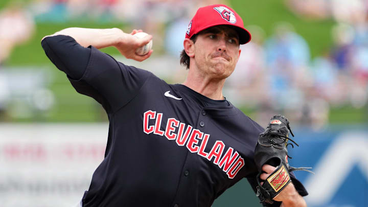 Mar 12, 2024; Surprise, Arizona, USA; Cleveland Guardians starting pitcher Shane Bieber (57) bats against the Texas Rangers during the second inning at Surprise Stadium