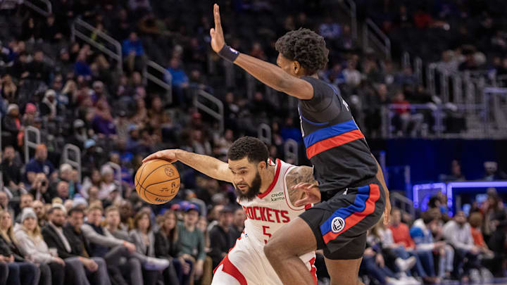 Jan 12, 2024; Detroit, Michigan, USA; Detroit Pistons forward Ausar Thompson (9) defends against Houston Rockets guard Fred VanVleet (5): David Reginek-Imagn Images