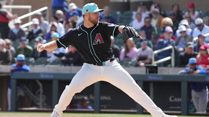 Mar 3, 2025; Salt River Pima-Maricopa, Arizona, USA; Arizona Diamondbacks pitcher Corbin Burnes (39) throws against the Chicago Cubs in the first inning at Salt River Fields at Talking Stick.