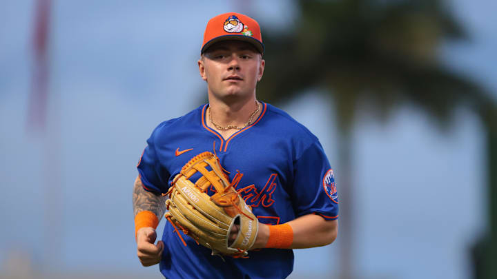 Mar 13, 2026; West Palm Beach, Florida, USA; New York Mets left fielder A.J. Ewing (97) returns to the dugout against the Washington Nationals during the second inning at CACTI Park of the Palm Beaches. Mandatory Credit: Sam Navarro-Imagn Images