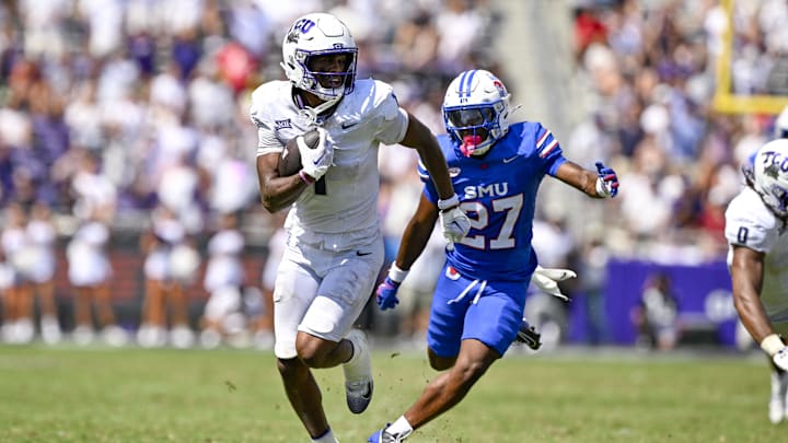 Sep 20, 2025; Fort Worth, Texas, USA; TCU Horned Frogs wide receiver Eric McAlister (1) runs with the ball during the game between the TCU Horned Frogs and the SMU Mustangs at Amon G. Carter Stadium. Mandatory Credit: Jerome Miron-Imagn Images