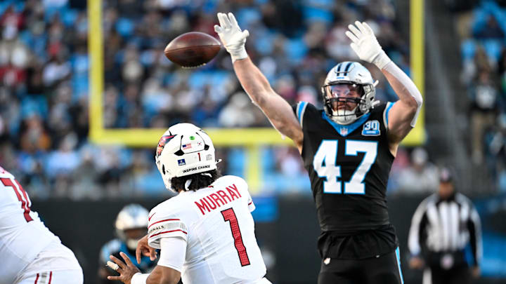 Dec 22, 2024; Charlotte, North Carolina, USA; Arizona Cardinals quarterback Kyler Murray (1) passes the ball as Carolina Panthers linebacker Josey Jewell (47) pressures in the third quarter at Bank of America Stadium. Mandatory Credit: Bob Donnan-Imagn Images Dec 22, 2024; Charlotte, North Carolina, USA; Arizona Cardinals quarterback Kyler Murray (1) passes the ball as Carolina Panthers linebacker Josey Jewell (47) pressures in the third quarter at Bank of America Stadium. Mandatory Credit: Bob Donnan-Imagn Images