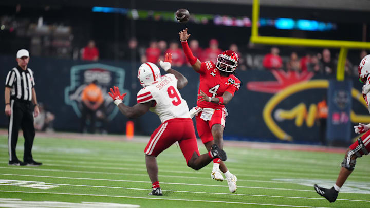Nebraska linebacker Vincent Shavers pressures Utah quarterback Devon Dampier in the second half during the Las Vegas Bowl at Allegiant Stadium.