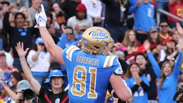 Nov 18, 2023; Los Angeles, California, USA; UCLA Bruins tight end Hudson Habermehl (81) celebrates after a touchdown during the first quarter against the USC Trojans at United Airlines Field at Los Angeles Memorial Coliseum. Mandatory Credit: Jason Parkhurst-Imagn Images Nov 18, 2023; Los Angeles, California, USA; UCLA Bruins tight end Hudson Habermehl (81) celebrates after a touchdown during the first quarter against the USC Trojans at United Airlines Field at Los Angeles Memorial Coliseum. Mandatory Credit: Jason Parkhurst-Imagn Images