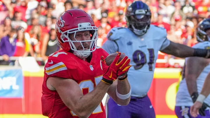 Sep 28, 2025; Kansas City, Missouri, USA; Kansas City Chiefs tight end Travis Kelce (87) catches a pass against the Baltimore Ravens during the game at GEHA Field at Arrowhead Stadium. Mandatory Credit: Denny Medley-Imagn Images