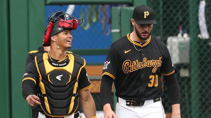 Apr 14, 2025; Pittsburgh, Pennsylvania, USA;  Pittsburgh Pirates catcher Endy Rodriguez (5) and starting pitcher Paul Skenes (30) make their way in from the bullpen to play the Washington Nationals at PNC Park. Mandatory Credit: Charles LeClaire-Imagn Images