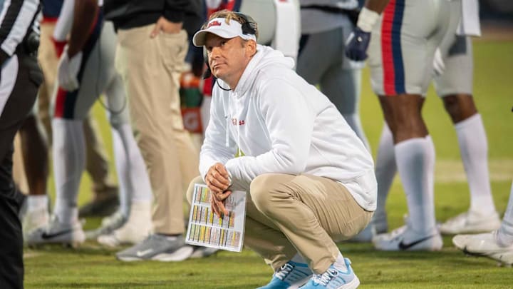 Ole Miss coach Lane Kiffin looks up at the scoreboard during a time out in second half of the Egg Bowl at Davis Wade Stadium in Starkville, Miss., Thursday, Nov. 23, 2023.
