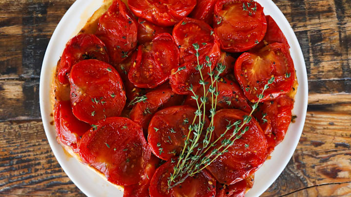 Tomato tarte tatin on a plate.