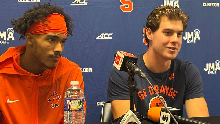 Syracuse WR Umari Hatcher (l), and QB Steve Angeli meet the media after helping to lead the Orange to a 31-30 OT win at North Carolina, snapping SU's 11-game ACC losing streak. Syracuse WR Umari Hatcher (l), and QB Steve Angeli meet the media after helping to lead the Orange to a 31-30 OT win at North Carolina, snapping SU's 11-game ACC losing streak.